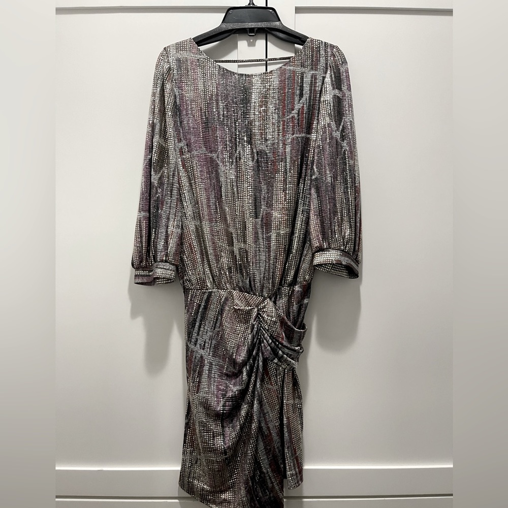 Gorgeous, sexy, low back dress. Perfect for the holidays or a fun night out!